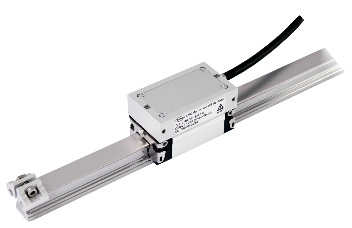 Acu-Rite LMF 9310 Inductive Encoder, a measuring device with a metallic body and a small digital display, mounted on a slim-profile rail.